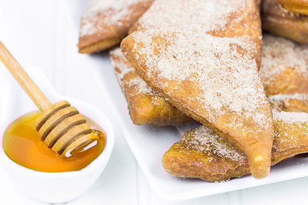 Dusted with cinnamon and sugar and served with honey, these Cinnamon Sugar Sopapillas are the perfect way to end a meal!
