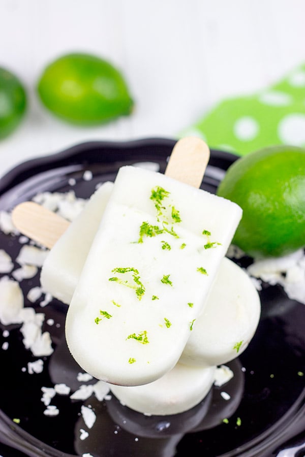 These tropical Coconut Lime Popsicles are a fun and refreshing snack on a hot summer afternoon!