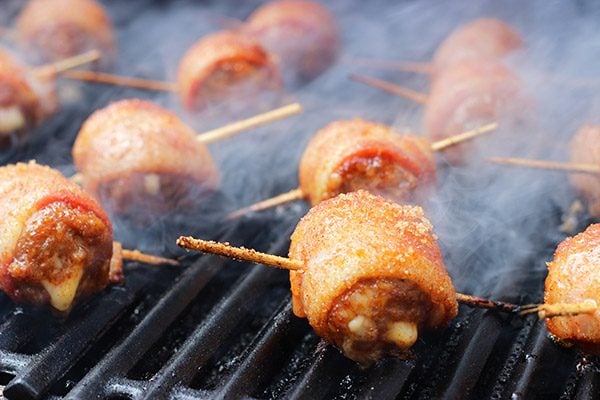 Whether in your backyard or at a picnic in the park, these Bacon-Wrapped Brats are perfect for summer grilling!