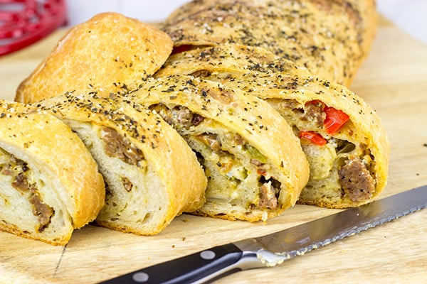 Spicy Italian Sausage Roll Filled With Sausage Peppers And Onions spicy-italian-sausage-roll-filled-with-sausage-peppers-and-onions
