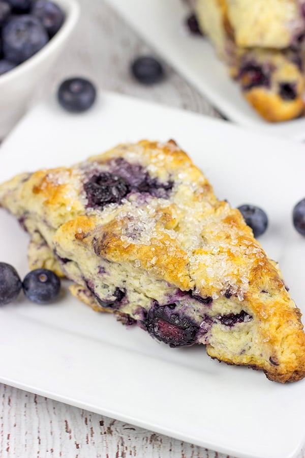 These Classic Blueberry Scones are a cross between a flavorful blueberry muffin and a crumbly buttermilk biscuit. I dare you to eat just one!