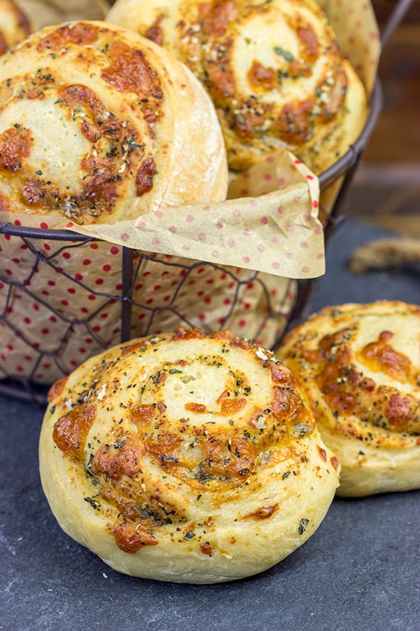 Instead of cinnamon and sugar, these Parmesan Cheese Rolls are stuffed with Italian herbs and cheeses...I dare you to eat just one!
