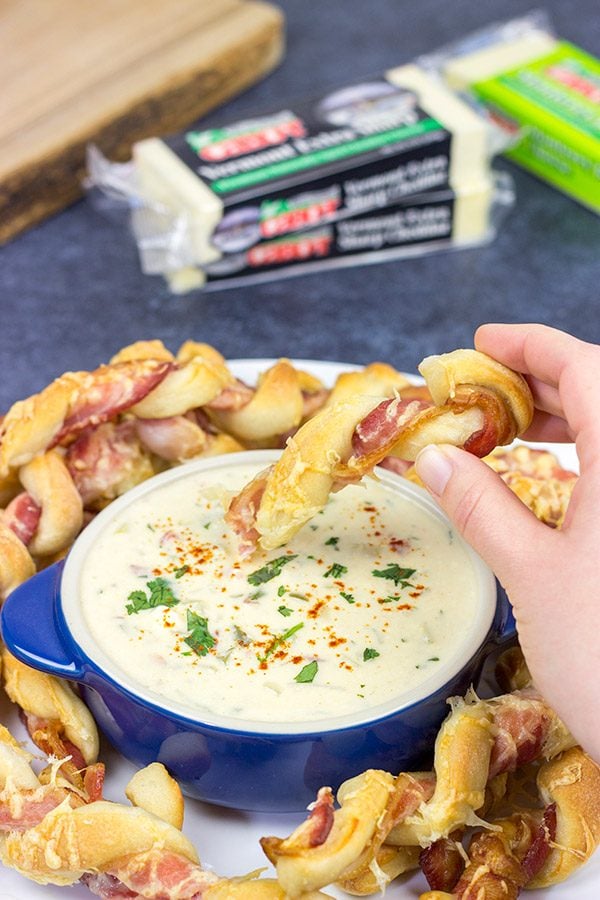 Bacon.  Cheese.  Breadsticks.  What else do you need?  These Bacon Wrapped Breadsticks with Queso are a unique and delicious football party appetizer!