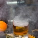 This Smoked Old Fashioned introduces maple syrup and smoke for a fun twist on a classic cocktail!