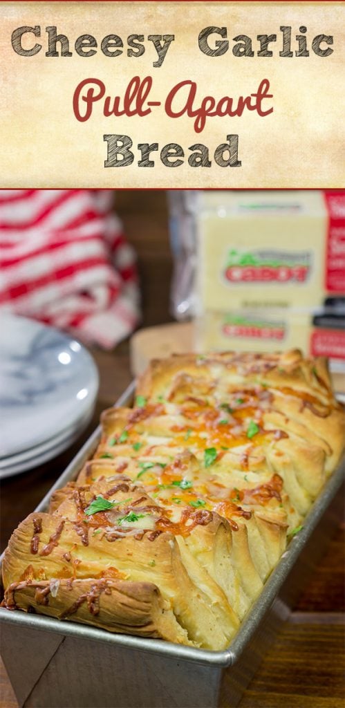 Looking for a fun (and tasty!) bread recipe?  Bake up a loaf of this Cheesy Garlic Pull Apart Bread...and then have fun peeling off layer after layer of cheesy bread!