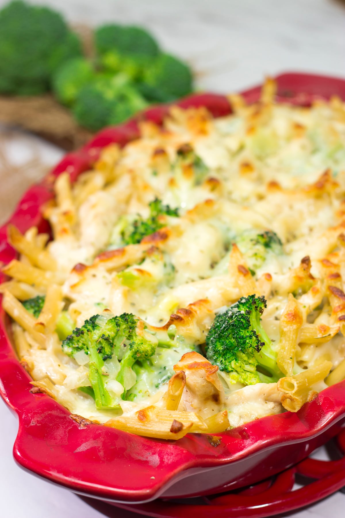 Filled with juicy chicken, broccoli and a cheesy alfredo sauce, this Cheesy Chicken and Broccoli Pasta Bake is a great comfort food meal!