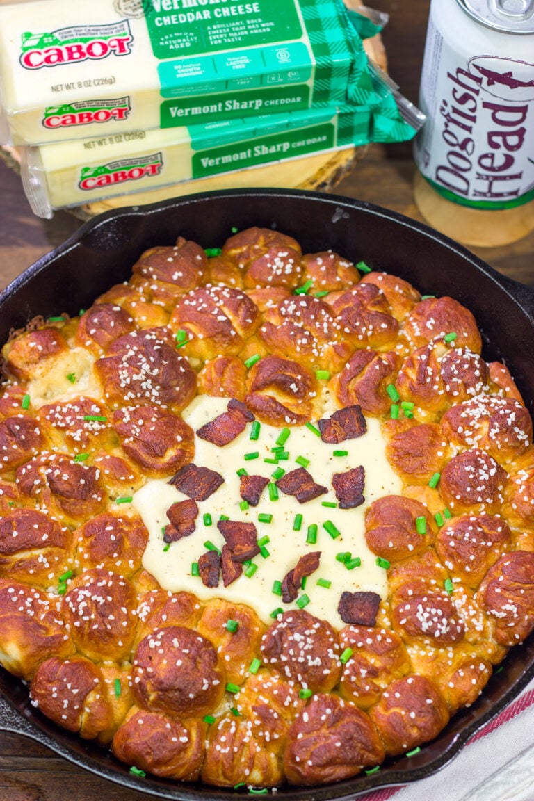 This Pull Apart Pretzel Skillet features warm, soft pretzels served with Beer Cheese. It's the perfect way to celebrate Oktoberfest and Autumn days in general!