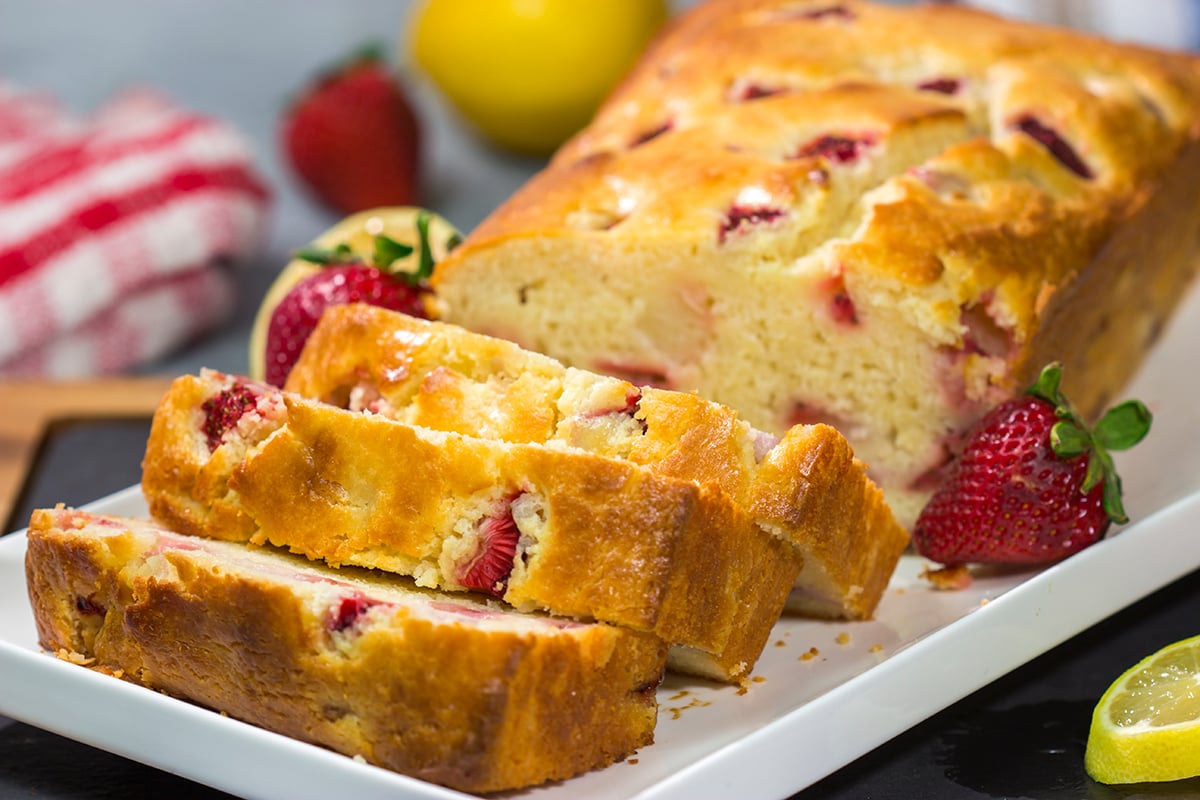 This Strawberry Lemonade Quick Bread is a delicious combination of sweet and tart - it's a great way to bake with juicy summer strawberries!