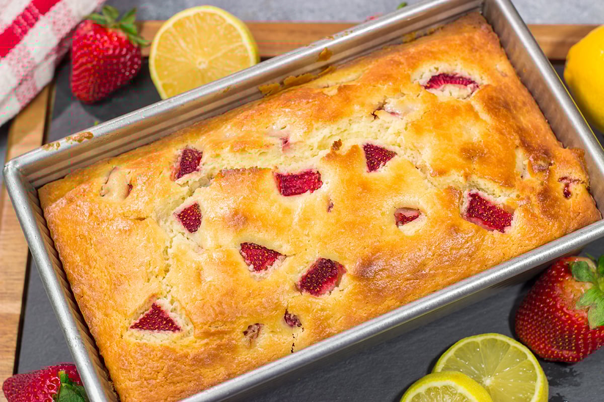This Strawberry Lemonade Quick Bread is a delicious combination of sweet and tart - it's a great way to bake with juicy summer strawberries!
