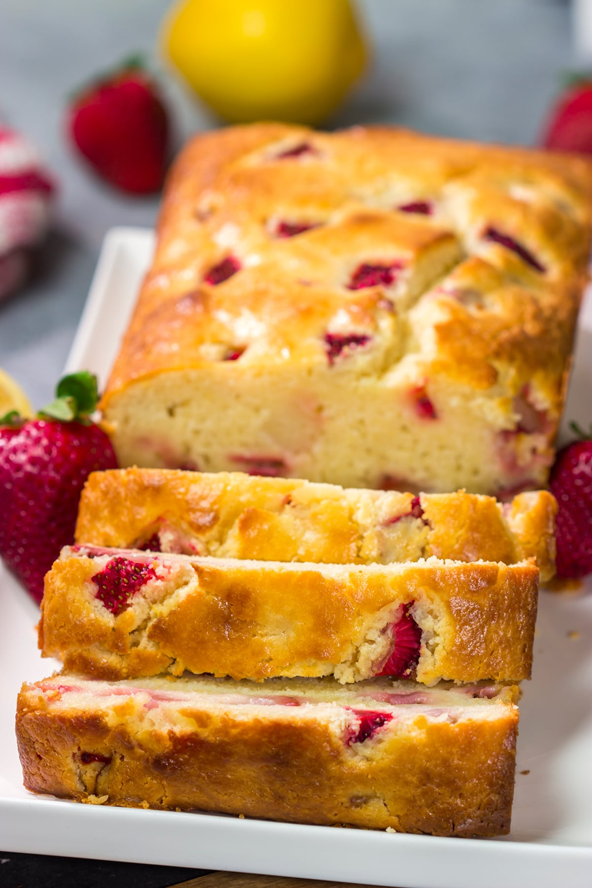 This Strawberry Lemonade Quick Bread is a delicious combination of sweet and tart - it's a great way to bake with juicy summer strawberries!