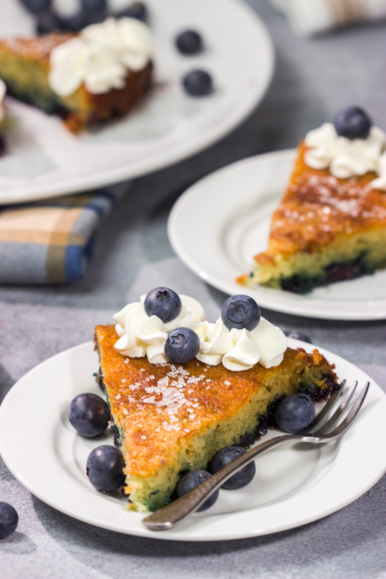 This Blueberry Buttermilk Cake is sweet, tangy...and super easy to make! It's a great recipe for warm summer mornings.