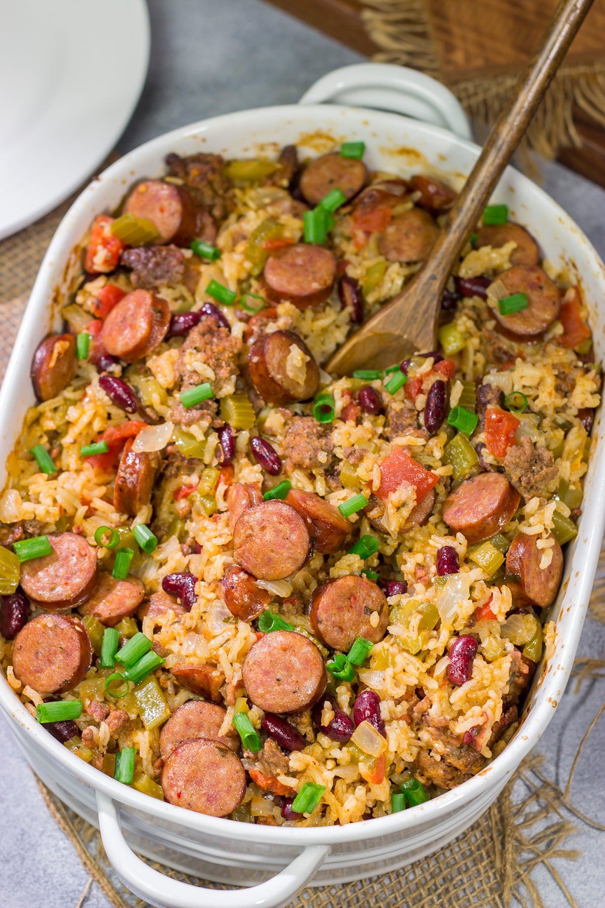 This Red Beans and Rice Casserole is an easy and delicious meal! The rice gets baked in the oven which makes this a great weeknight recipe. Enjoy!