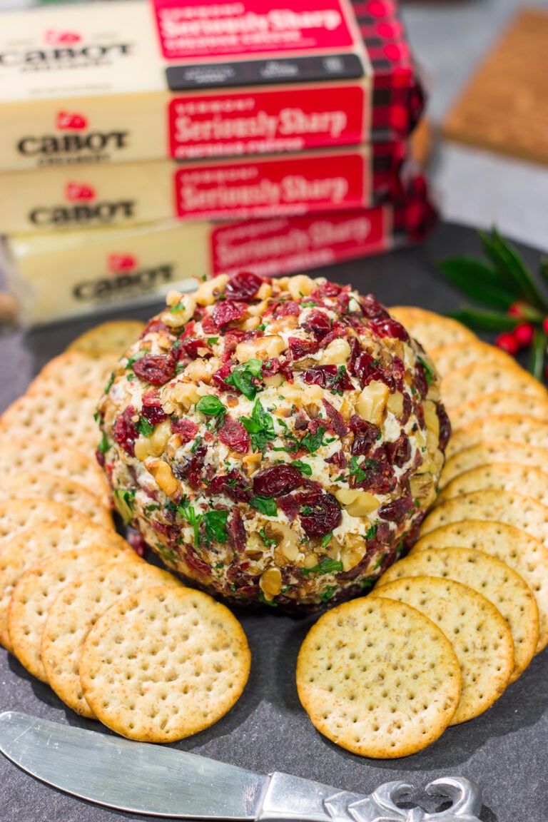 This Cranberry Walnut Cheese Ball is an easy and festive holiday appetizer. That leaves you more time to get back to being the holiday cheermeister!