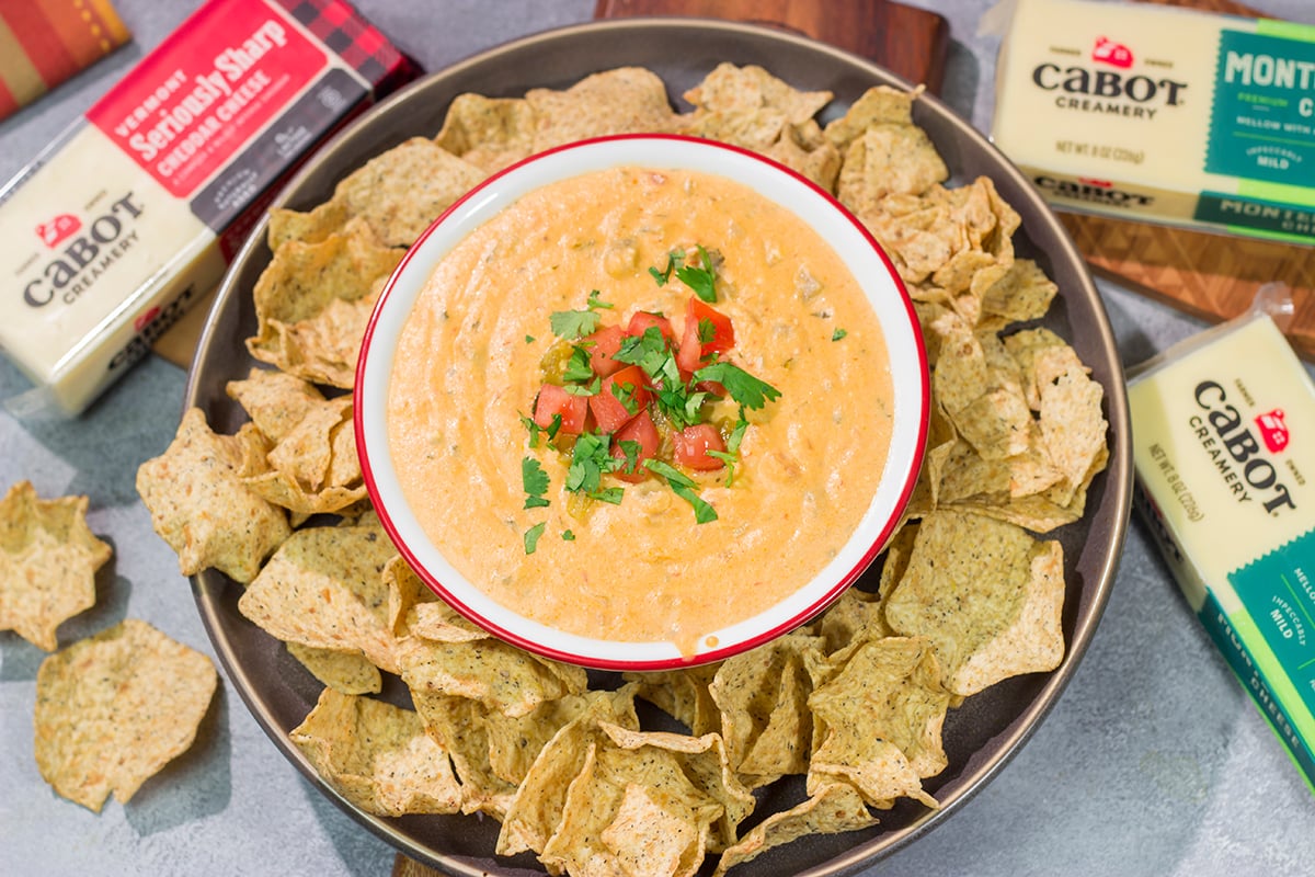 Whether it's a game night or a casual evening with friends, this Slow Cooker Queso is an easy and delicious appetizer that's sure to be a crowd favorite!