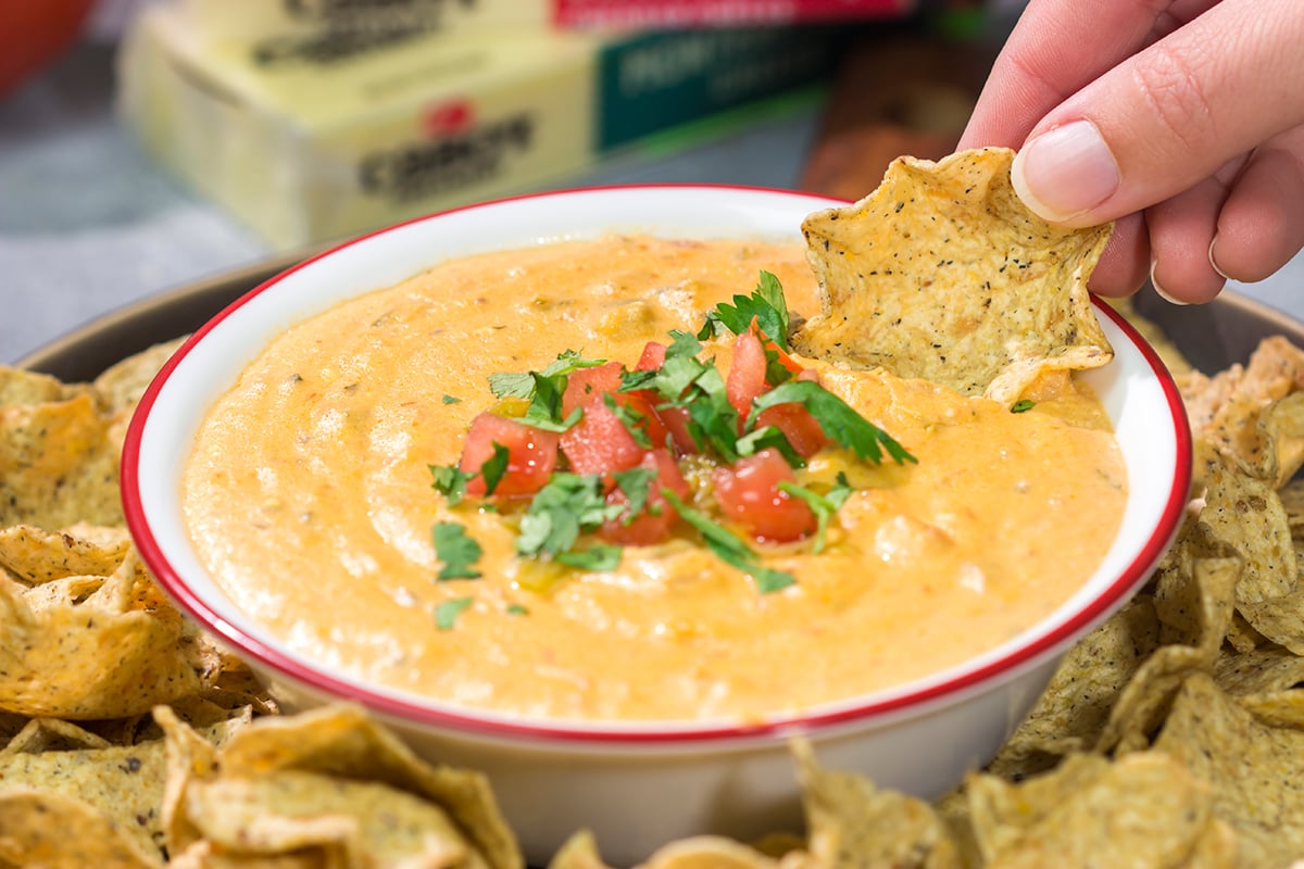 Whether it's a game night or a casual evening with friends, this Slow Cooker Queso is an easy and delicious appetizer that's sure to be a crowd favorite!