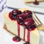 Featuring a creamy cheesecake base topping with an easy homemade cherry sauce, a slice of this Cherry Cheesecake makes for a delicious dessert. It's a classic for a reason!