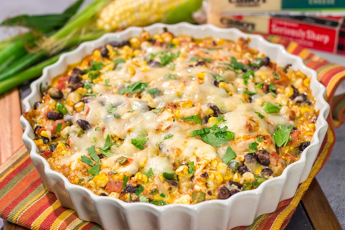 Featuring fresh corn combined with melty cheeses, this Black Bean and Corn Dip is a great party appetizer! Serve with tortilla chips, crackers or sliced veggies.