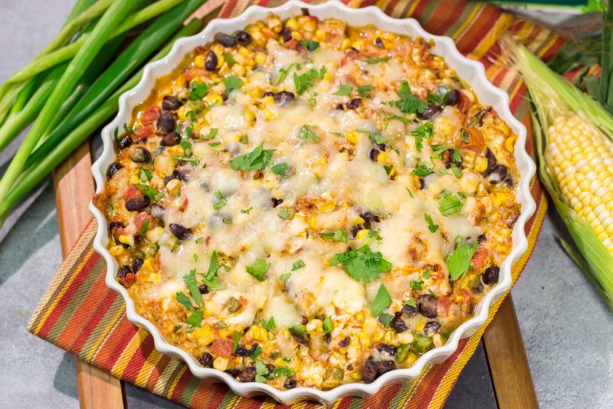 Featuring fresh corn combined with melty cheeses, this Black Bean and Corn Dip is a great party appetizer! Serve with tortilla chips, crackers or sliced veggies.