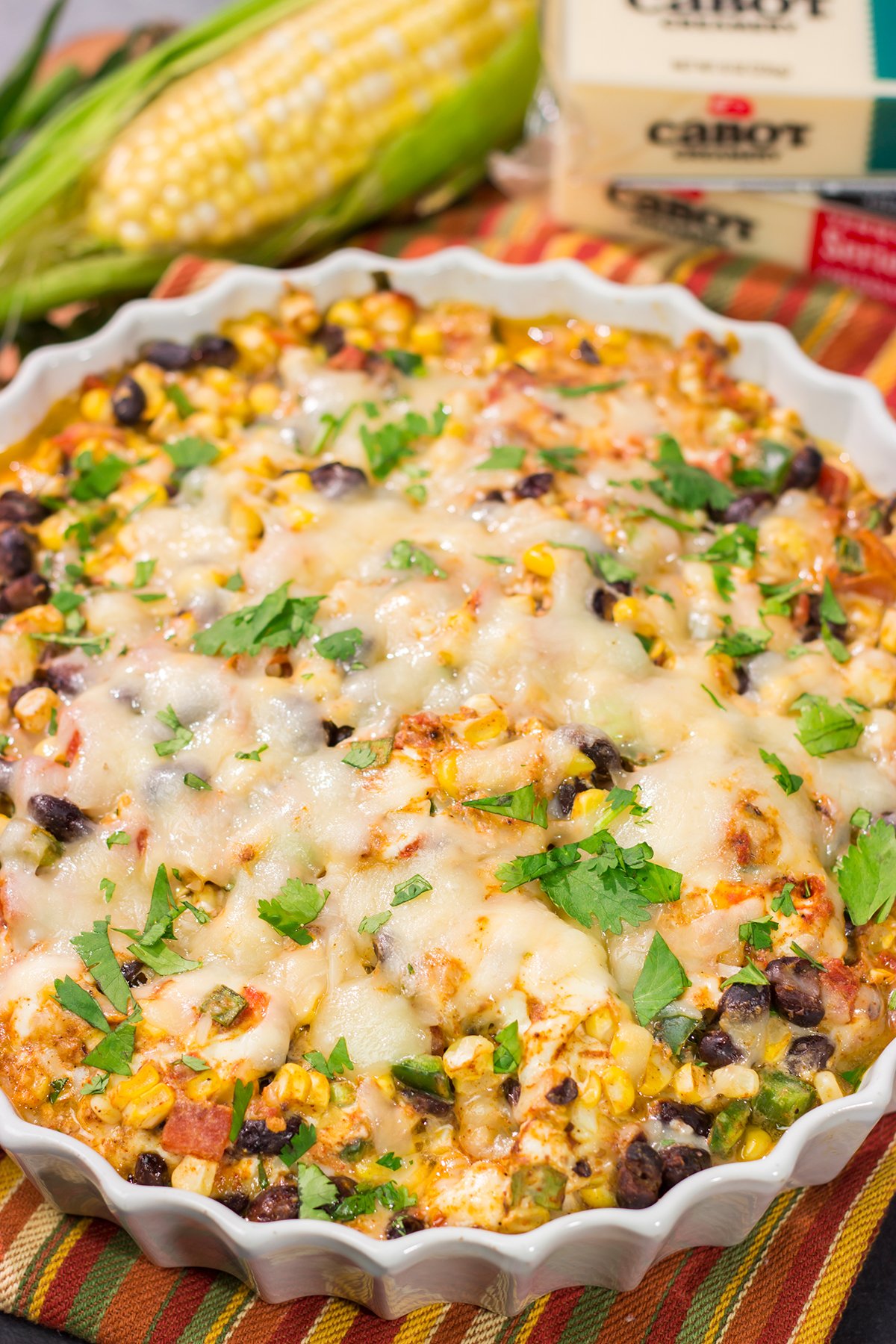 Featuring fresh corn combined with melty cheeses, this Black Bean and Corn Dip is a great party appetizer! Serve with tortilla chips, crackers or sliced veggies.