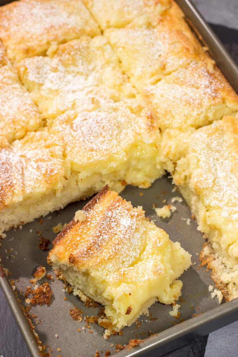A classic St. Louis dessert, a Gooey Butter Cake features a buttery cake base topped with a vanilla cream cheese layer - it is absolutely addicting! Say hello to your new favorite dessert!