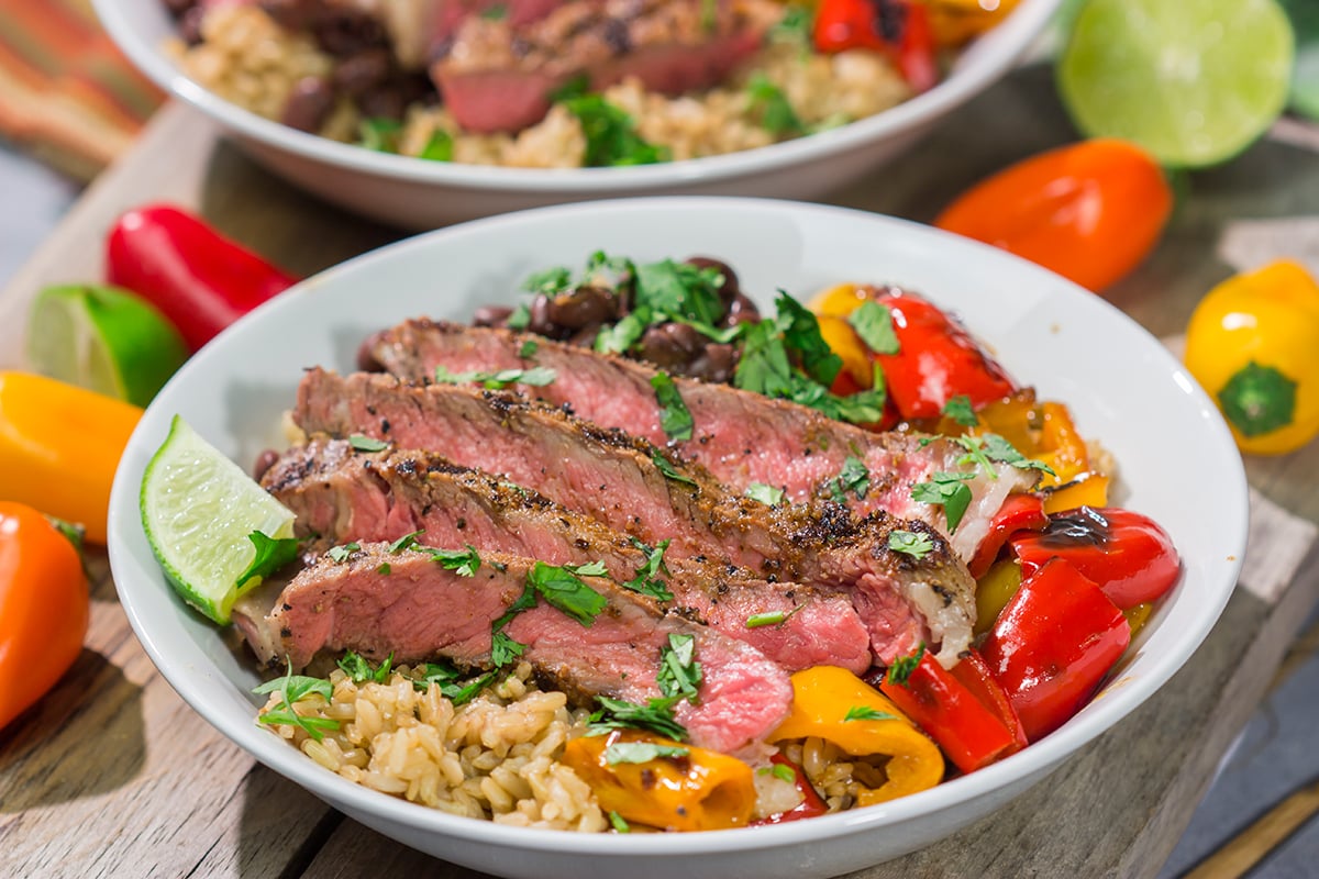 These Grilled Steak Burrito Bowls are packed with summer flavor, but they're easy enough to make on a weeknight. Happy Grilling!