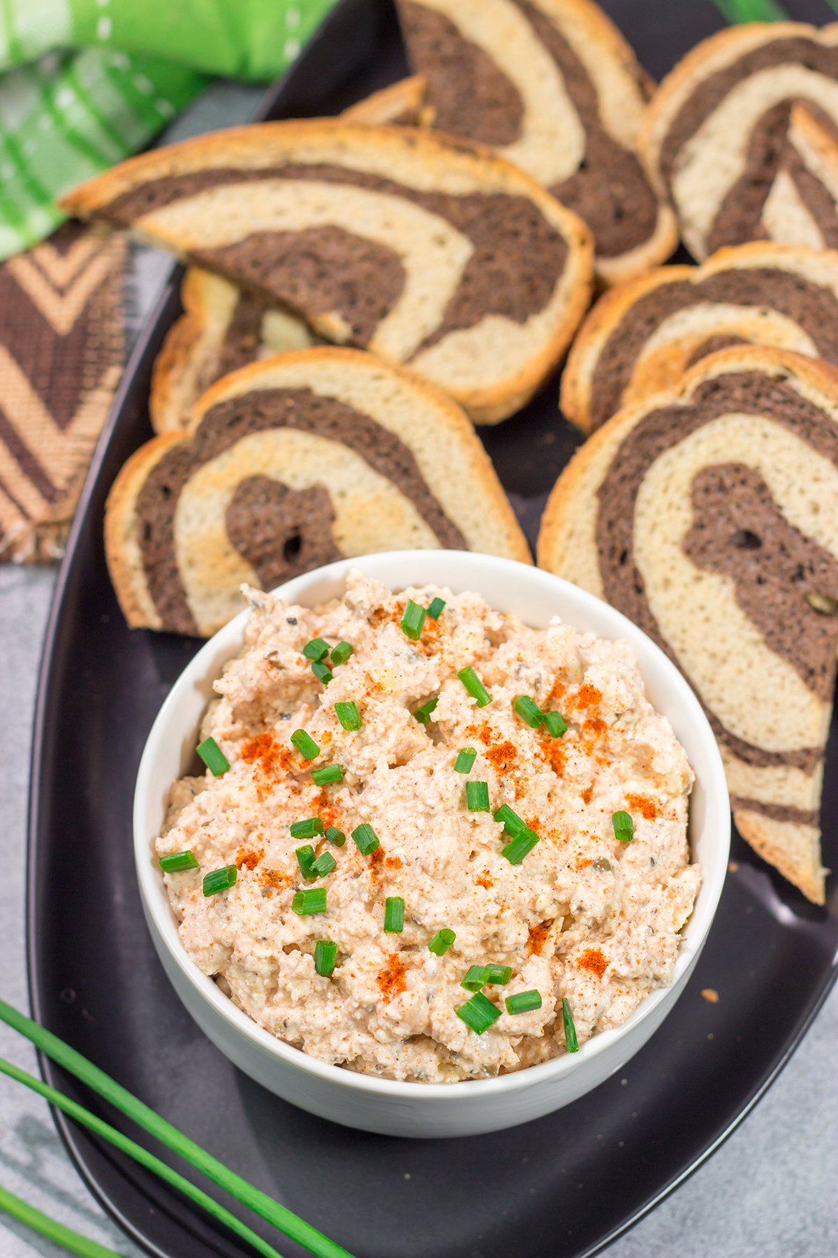 Liptauer is a tasty paprika-infused cheese spread popular throughout Austria, Hungary and Slovakia. This easy recipe is a great addition to an appetizer board!