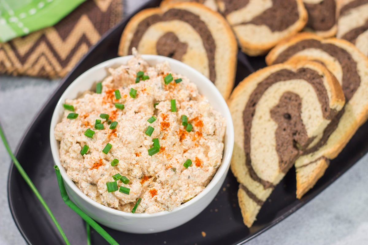 Liptauer is a tasty paprika-infused cheese spread popular throughout Austria, Hungary and Slovakia. This easy recipe is a great addition to an appetizer board!