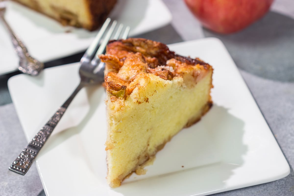 Featuring layers of sliced apples on both the bottom and top, this Danish Apple Cake is a delicious way to celebrate Autumn. This cake looks fancy, but it's very easy to make!