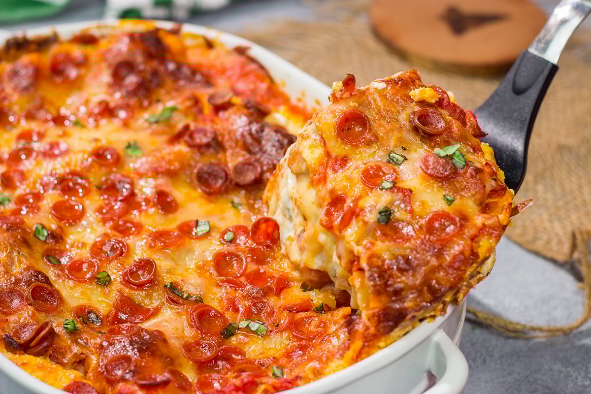Pizza or lasagna? Why not go for both in this fun mash-up of two favorite comfort foods? This Pepperoni Pizza Lasagna is sure to be a family favorite!