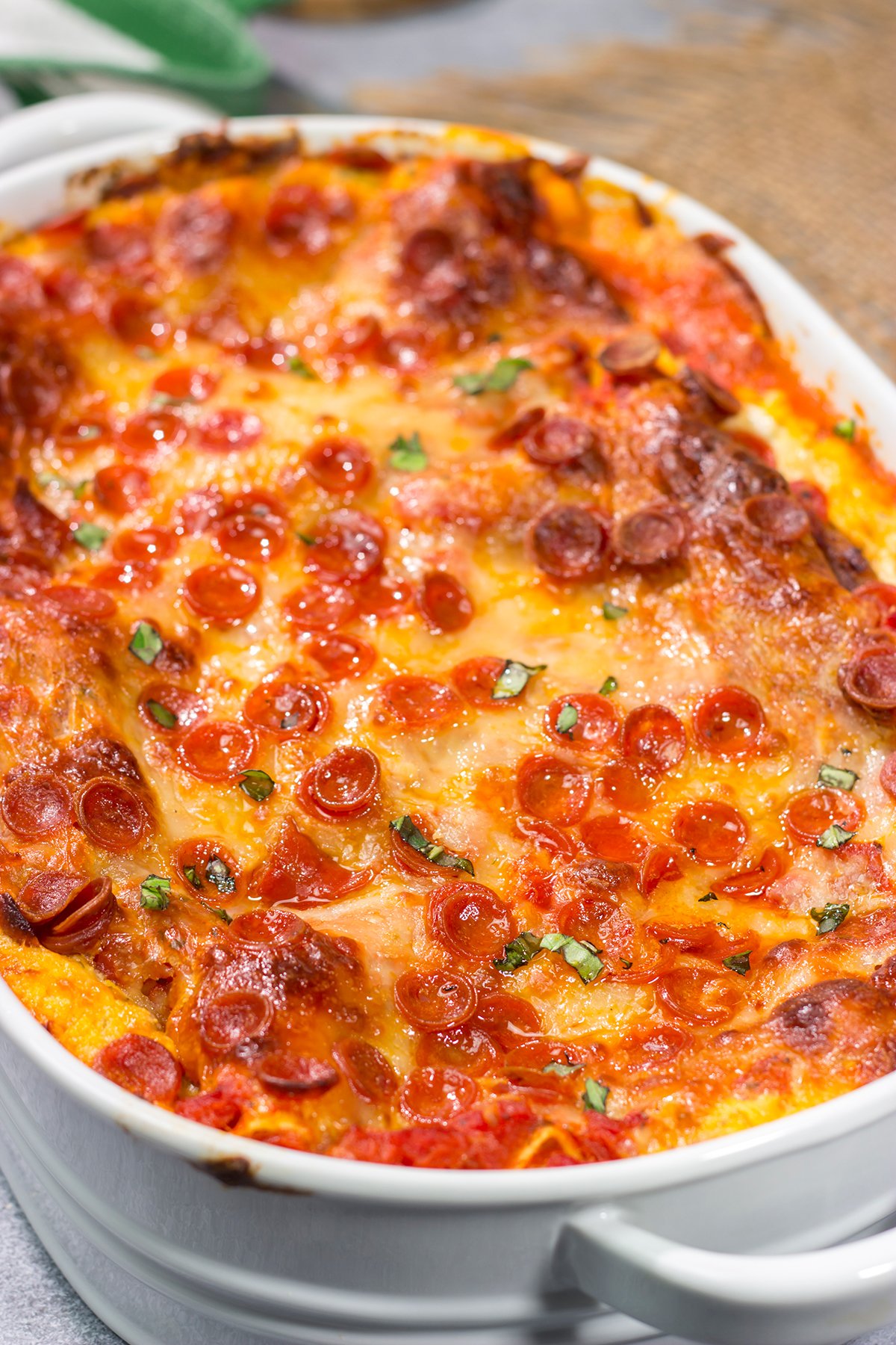 Pizza or lasagna? Why not go for both in this fun mash-up of two favorite comfort foods? This Pepperoni Pizza Lasagna is sure to be a family favorite!
