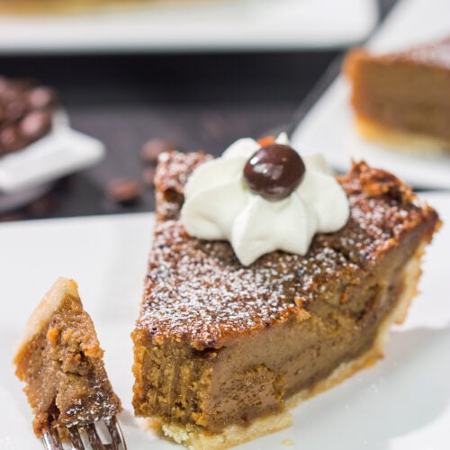 Love the flavor of coffee? Then this dessert is calling your name! This Coffee Chess Pie features a creamy coffee custard in a flaky pie shell. Grab a fork and dig in!