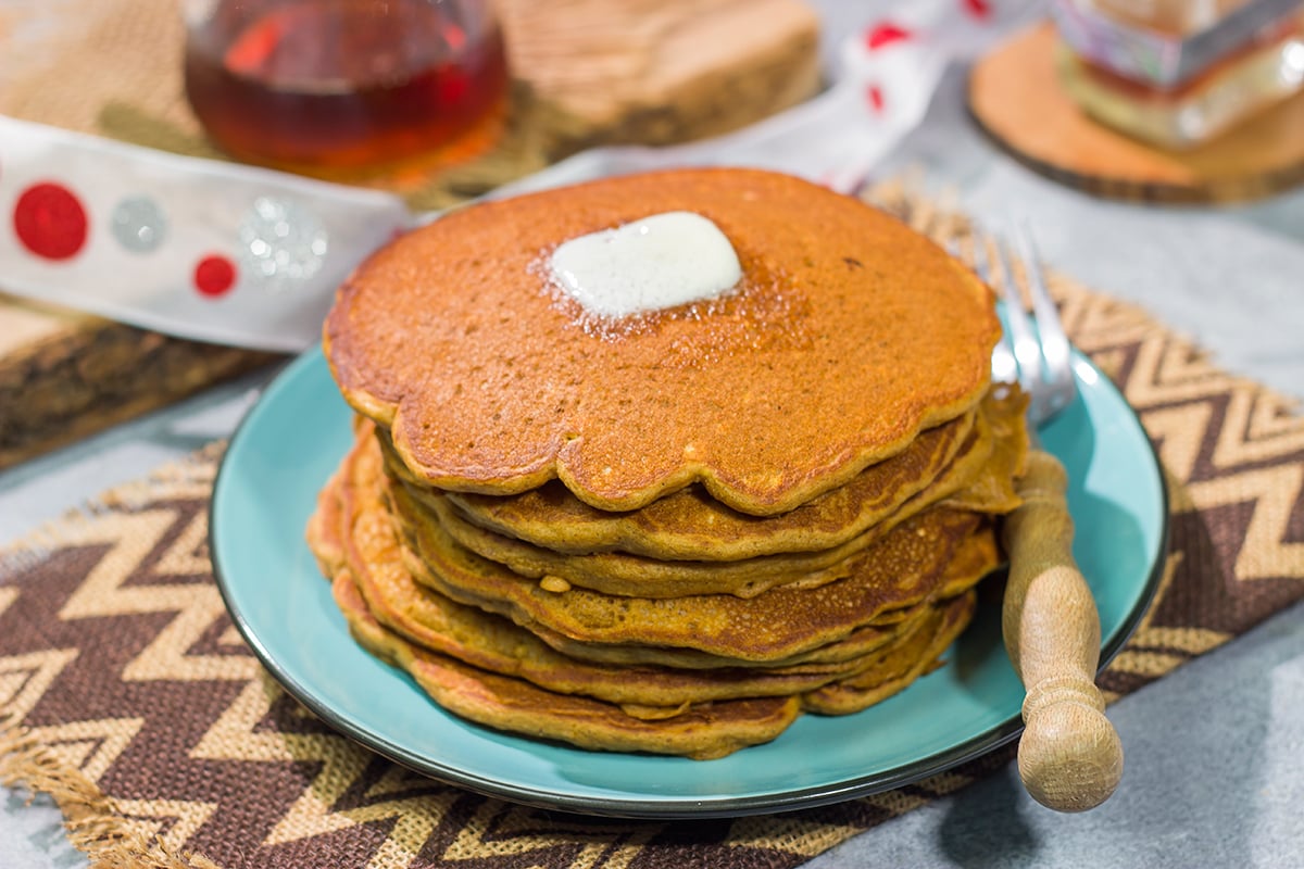 These Gingerbread Pancakes feature all of the classic gingerbread flavors...in pancake form. A stack of these pancakes is perfect for holiday brunch!