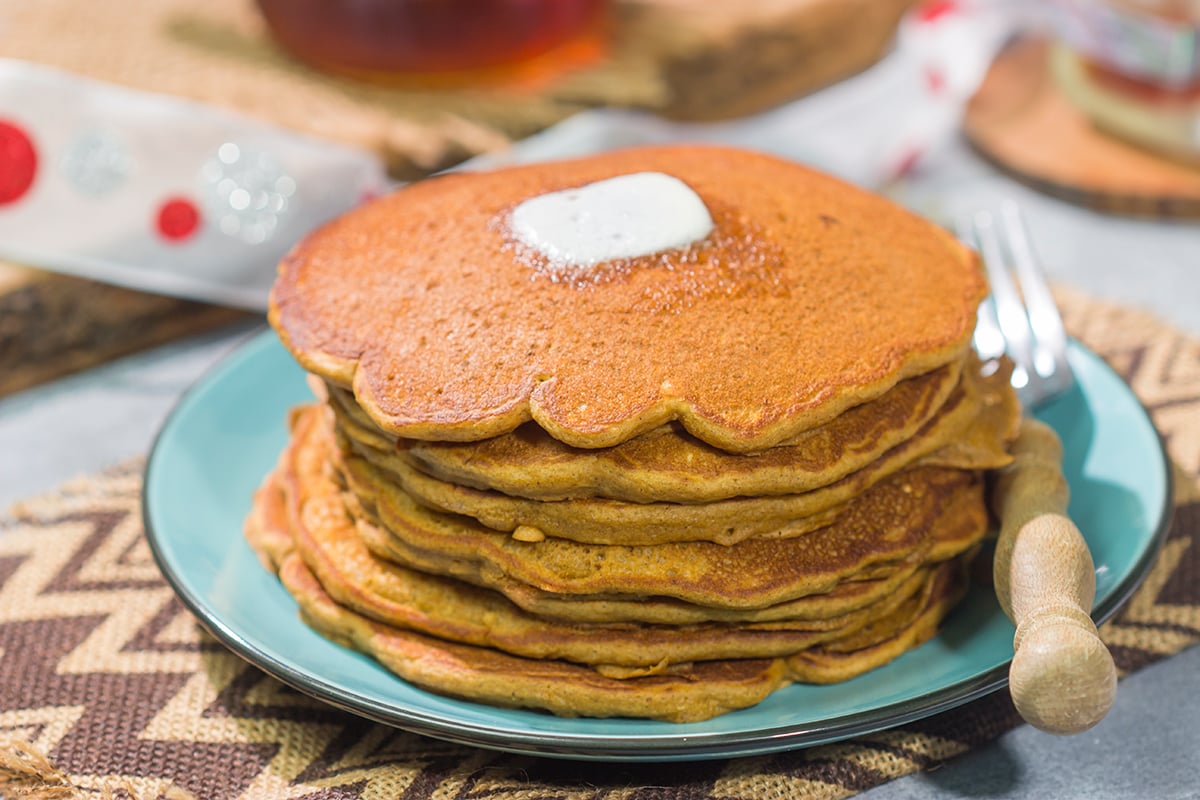 These Gingerbread Pancakes feature all of the classic gingerbread flavors...in pancake form. A stack of these pancakes is perfect for holiday brunch!