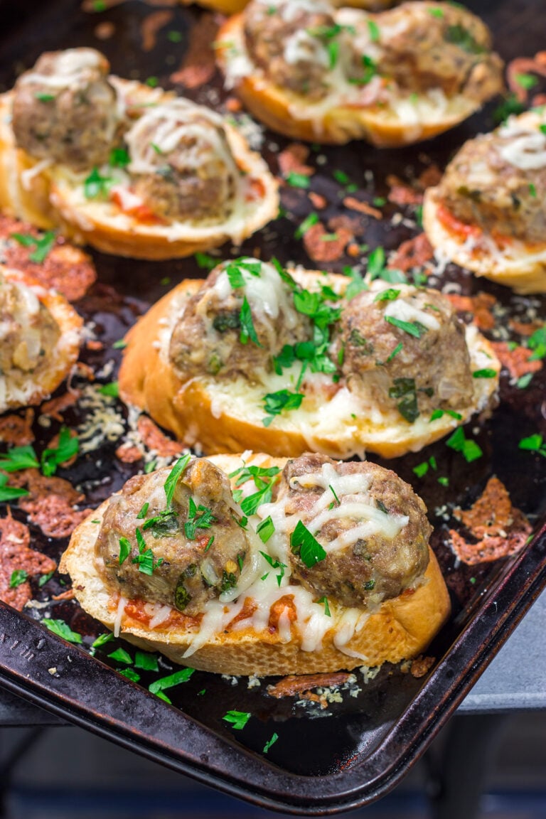 These delicious Open Faced Meatball Sandwiches are the ultimate comfort food! This recipe is an easy dinner idea but it's also great for feeding a crowd on gameday.
