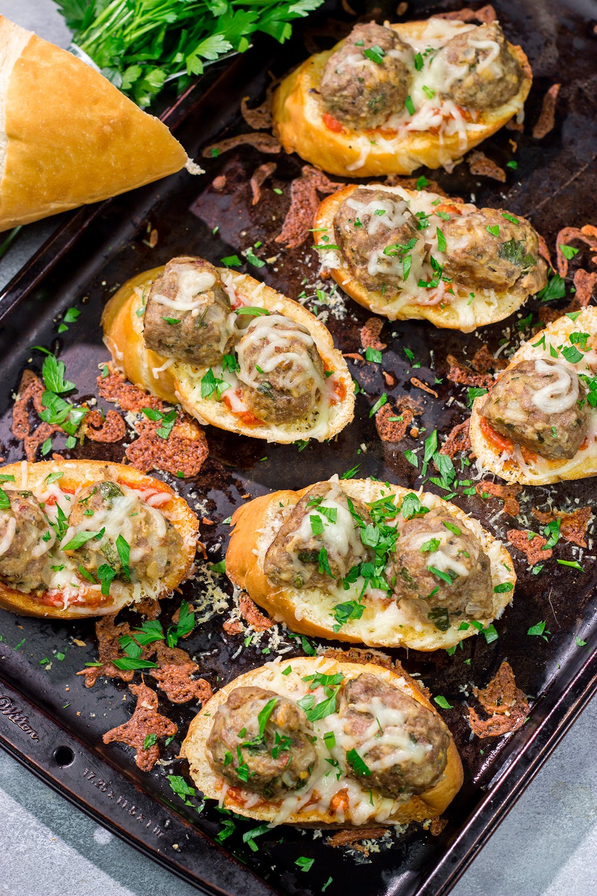 These delicious Open Faced Meatball Sandwiches are the ultimate comfort food! This recipe is an easy dinner idea but it's also great for feeding a crowd on gameday.