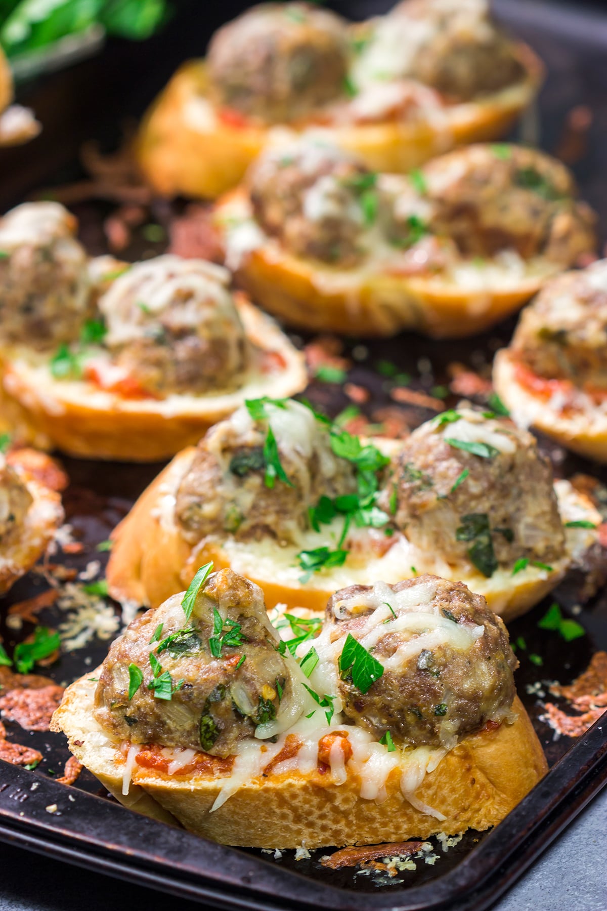 These delicious Open Faced Meatball Sandwiches are the ultimate comfort food! This recipe is an easy dinner idea but it's also great for feeding a crowd on gameday.