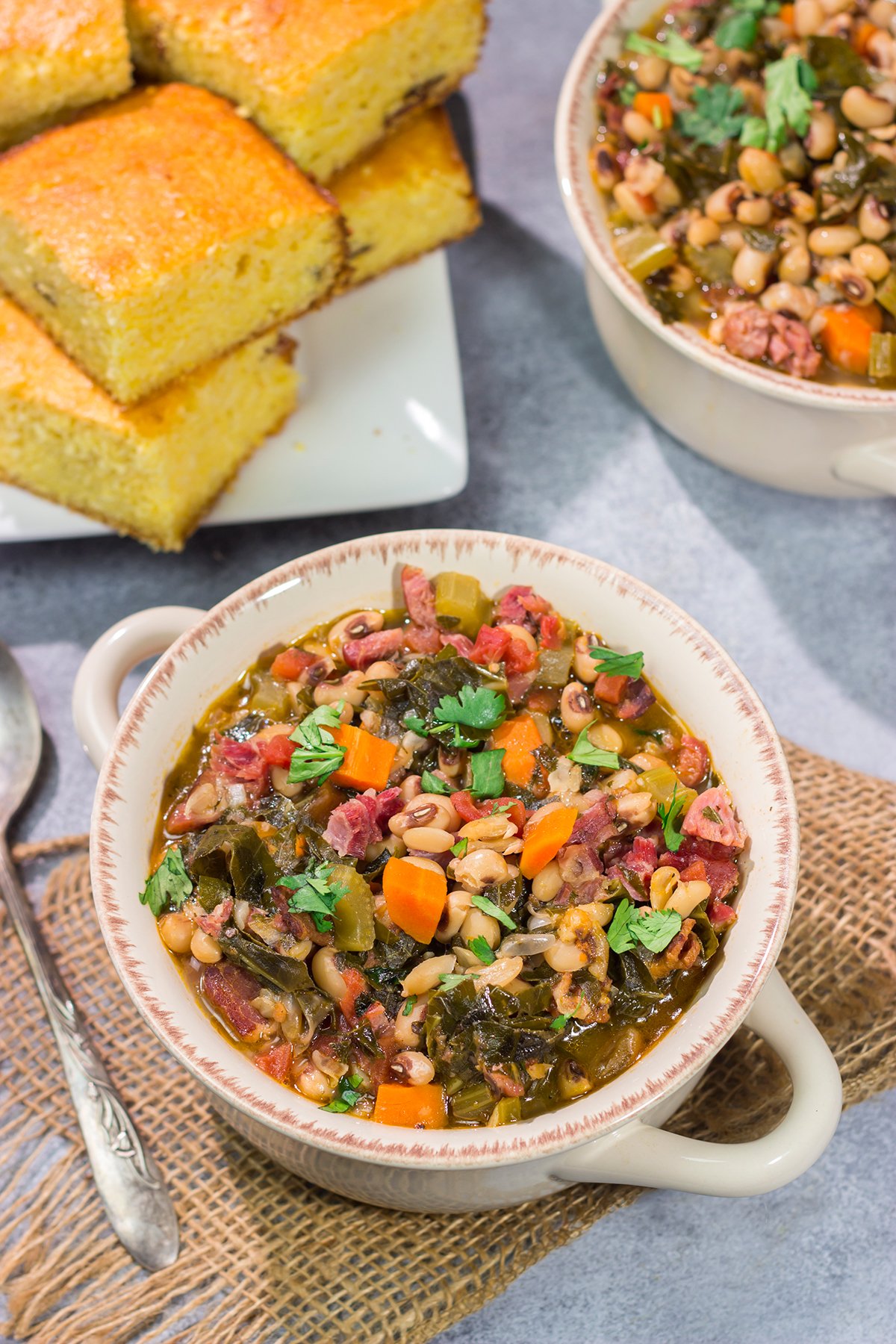 A bowl of this Black Eyed Pea Soup is sure to bring good luck - and it's delicious! Serve this hearty soup with a hunk of warm, buttered cornbread for the ultimate cozy meal.