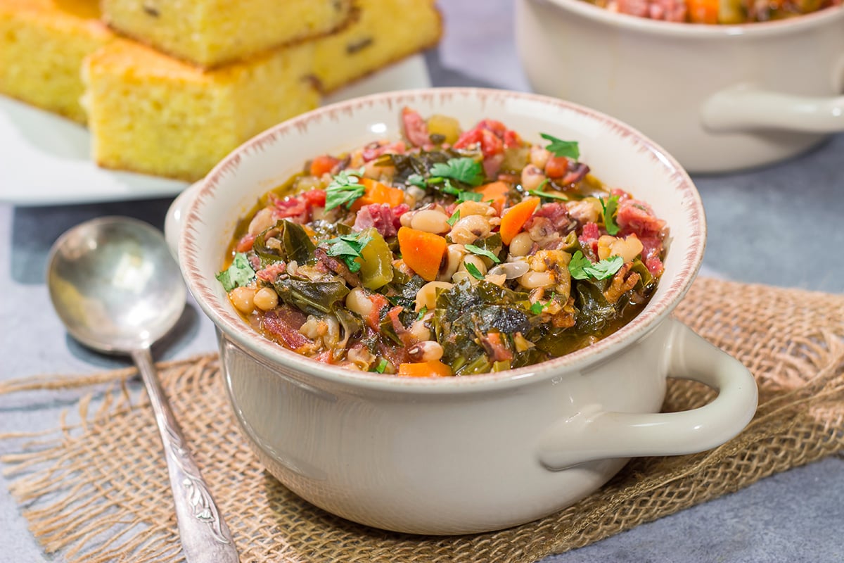 A bowl of this Black Eyed Pea Soup is sure to bring good luck - and it's delicious! Serve this hearty soup with a hunk of warm, buttered cornbread for the ultimate cozy meal.