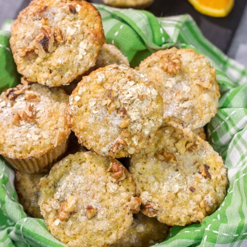 These Orange Walnut Muffins are bursting with citrus flavor. Add in the nutty walnuts, and you've got a fantastic treat for breakfast or brunch!