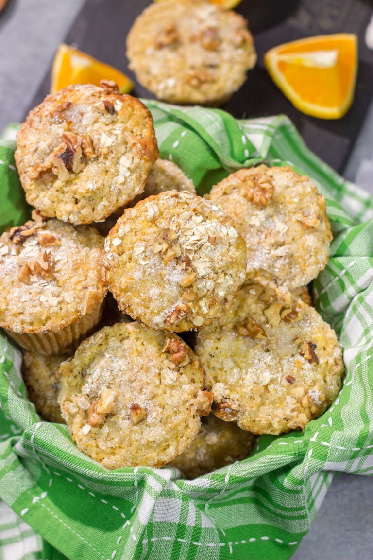 These Orange Walnut Muffins are bursting with citrus flavor. Add in the nutty walnuts, and you've got a fantastic treat for breakfast or brunch!