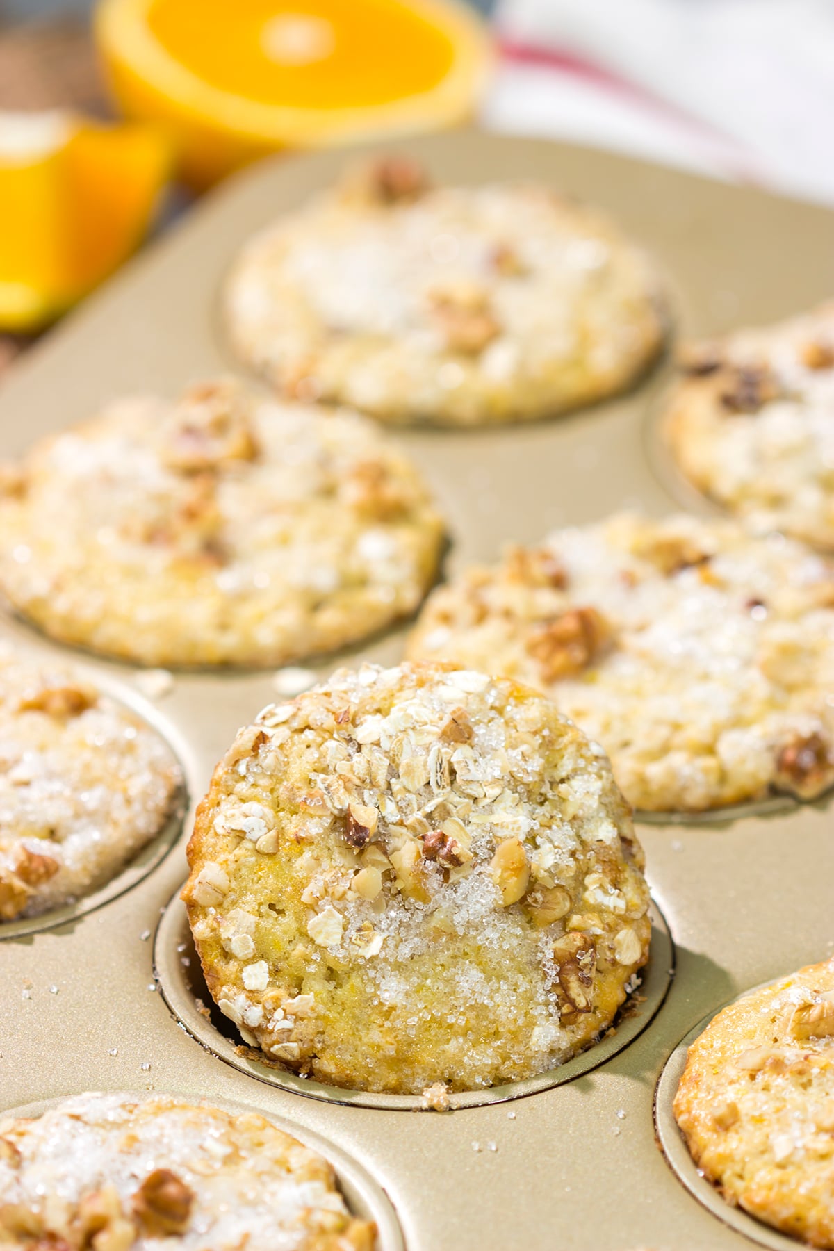 These Orange Walnut Muffins are bursting with citrus flavor. Add in the nutty walnuts, and you've got a fantastic treat for breakfast or brunch!