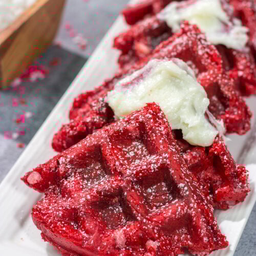 These Red Velvet Belgian Waffles are slightly crispy on the outside, but light and airy on the inside. They're a delicious way to celebrate Valentine's Day...or any day!