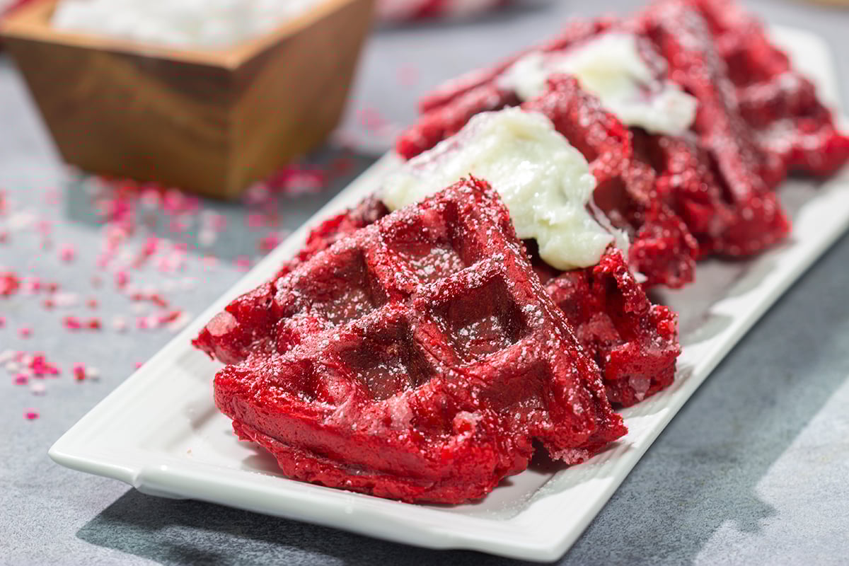 These Red Velvet Belgian Waffles are slightly crispy on the outside, but light and airy on the inside. They're a delicious way to celebrate Valentine's Day...or any day!