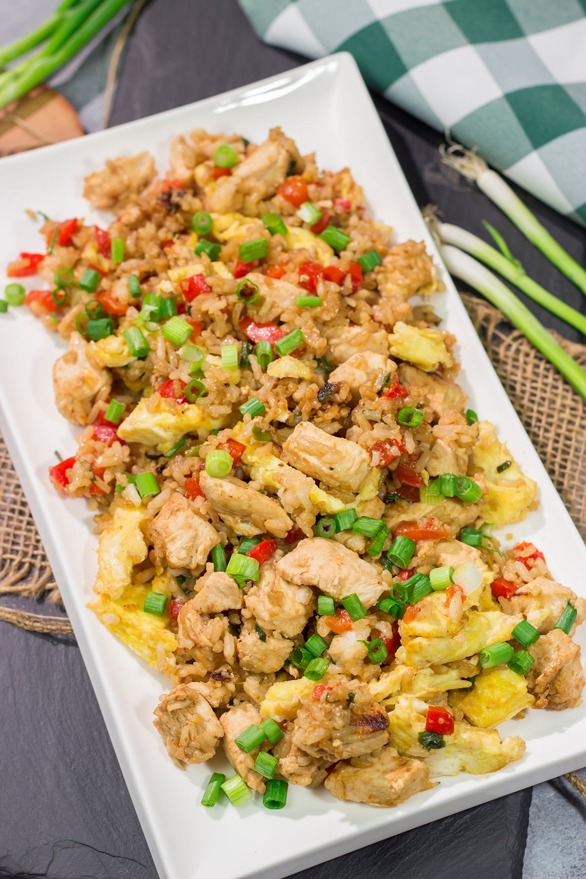 Arroz Chaufa, also known as Peruvian Fried Rice, is an example of fusion food at its best. Chinese and Peruvian flavors combine to create a delicious dish that is perfect for busy weeknights!