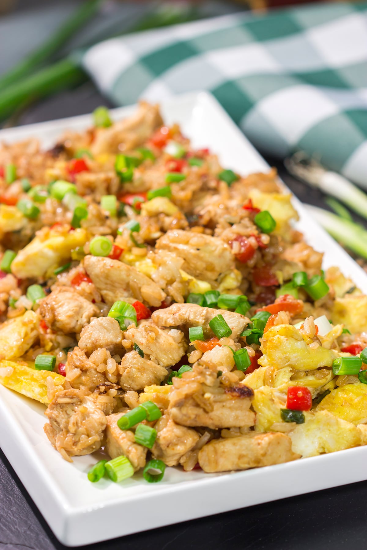 Arroz Chaufa, also known as Peruvian Fried Rice, is an example of fusion food at its best. Chinese and Peruvian flavors combine to create a delicious dish that is perfect for busy weeknights!
