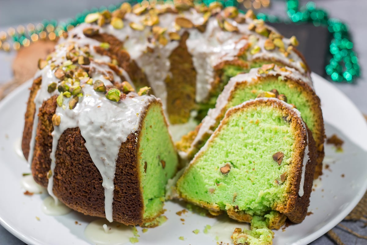 Featuring a mild nutty flavor, this homemade Pistachio Bundt Cake is a tasty dessert recipe. Top with a simple glaze and chopped pistachios for a mouthwatering appearance!