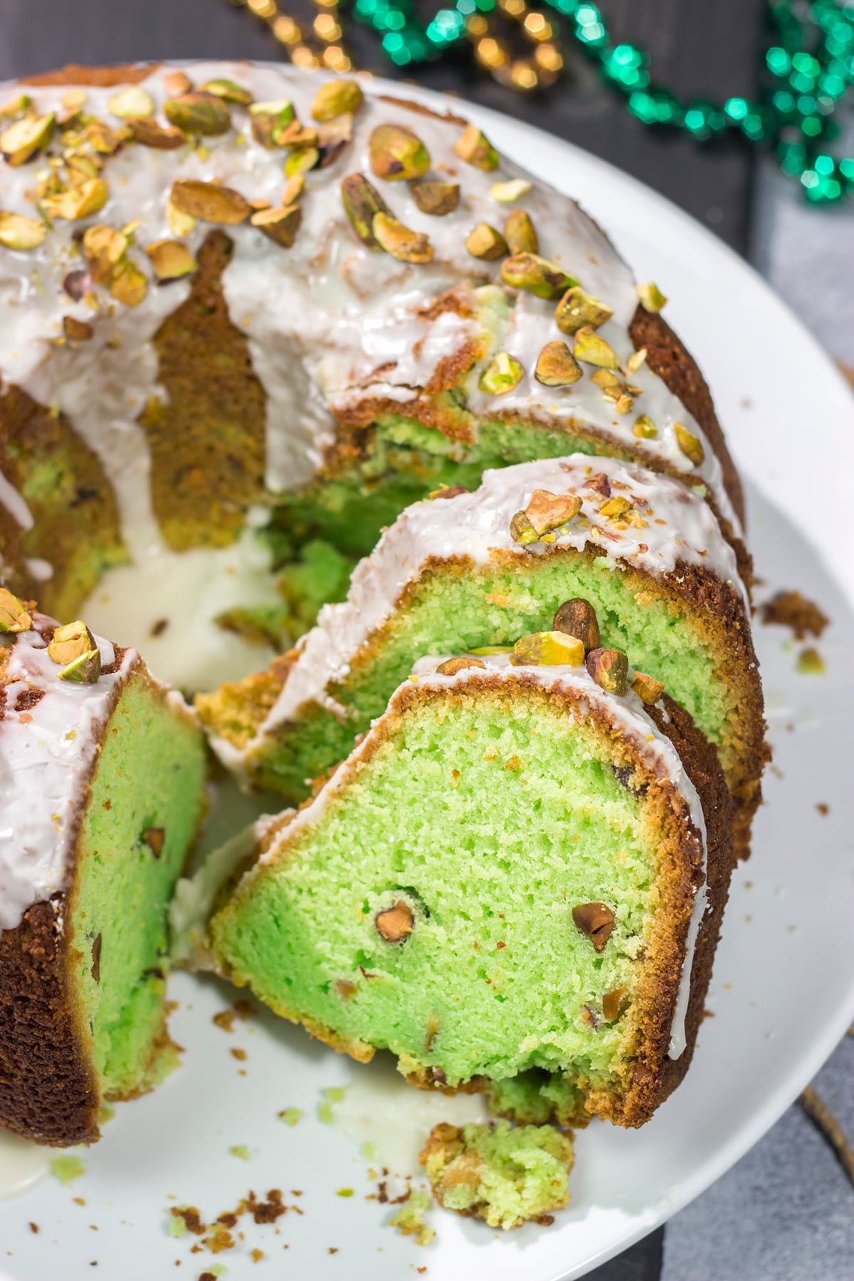 Featuring a mild nutty flavor, this homemade Pistachio Bundt Cake is a tasty dessert recipe. Top with a simple glaze and chopped pistachios for a mouthwatering appearance!