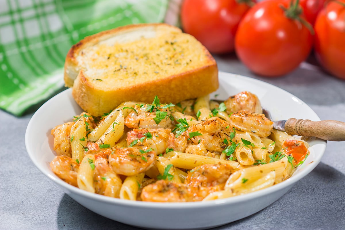 This Copycat Chili's Cajun Shrimp Pasta features creamy alfredo sauce tossed with succulent Cajun shrimp. It's delicious - and easy enough for a weeknight meal!