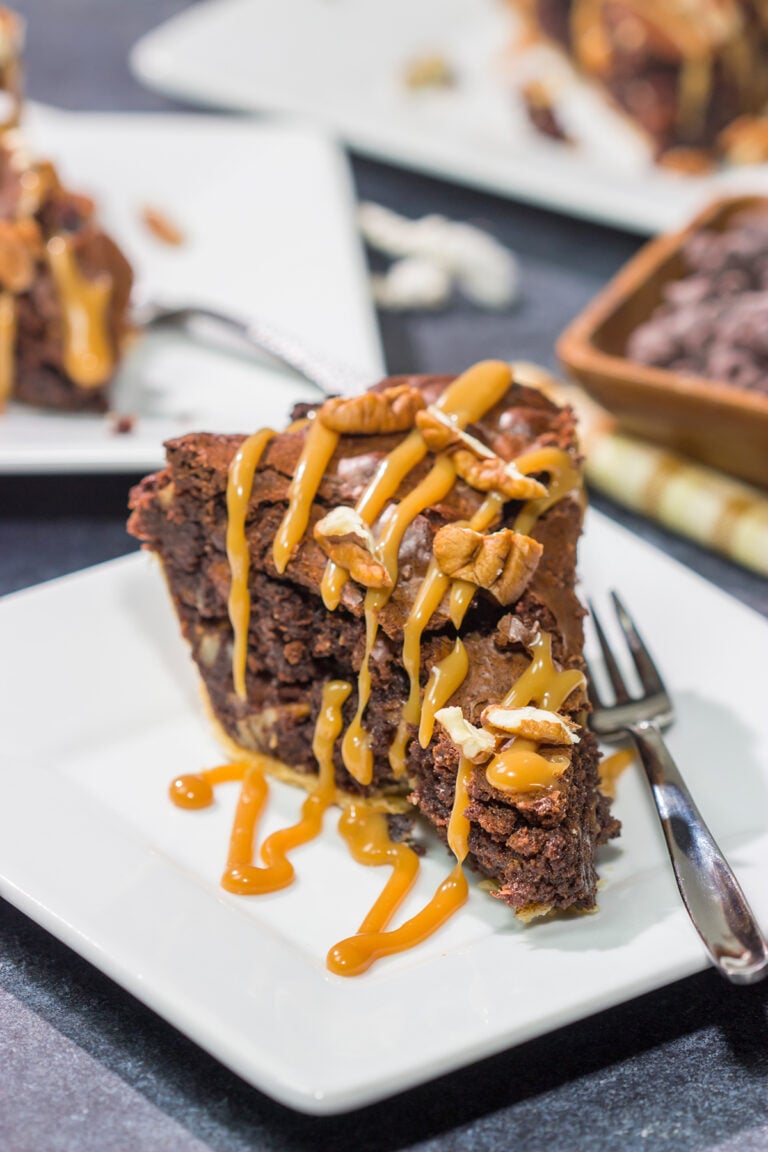 Is it a brownie? Is it a pie? It's both! This Caramel Pecan Brownie Pie is a fun mash-up of two favorite desserts. Enjoy!