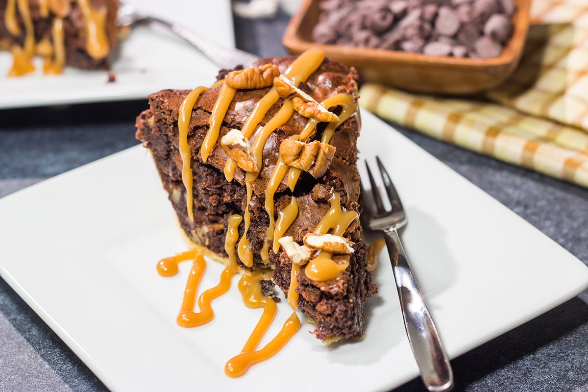 Is it a brownie? Is it a pie? It's both! This Caramel Pecan Brownie Pie is a fun mash-up of two favorite desserts. Enjoy!